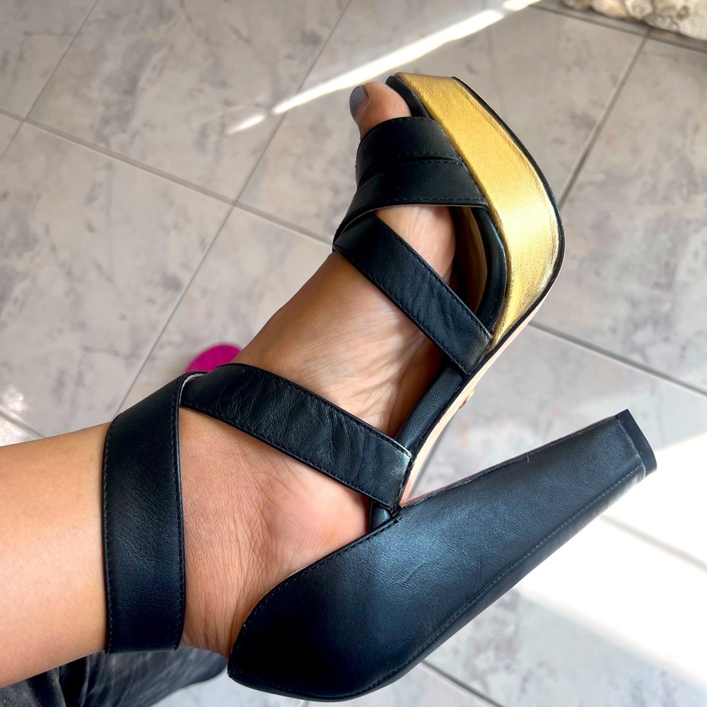 Black platform shoes with gold bottom platform in the front , size 37